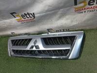 Máscara Mitsubishi Montero 2003 en adelante nuevo original - fotografía 2