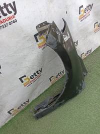 Tapabarro izquierdo Nissan Tiida 2006 en adelante usado en buen estado - fotografía 3